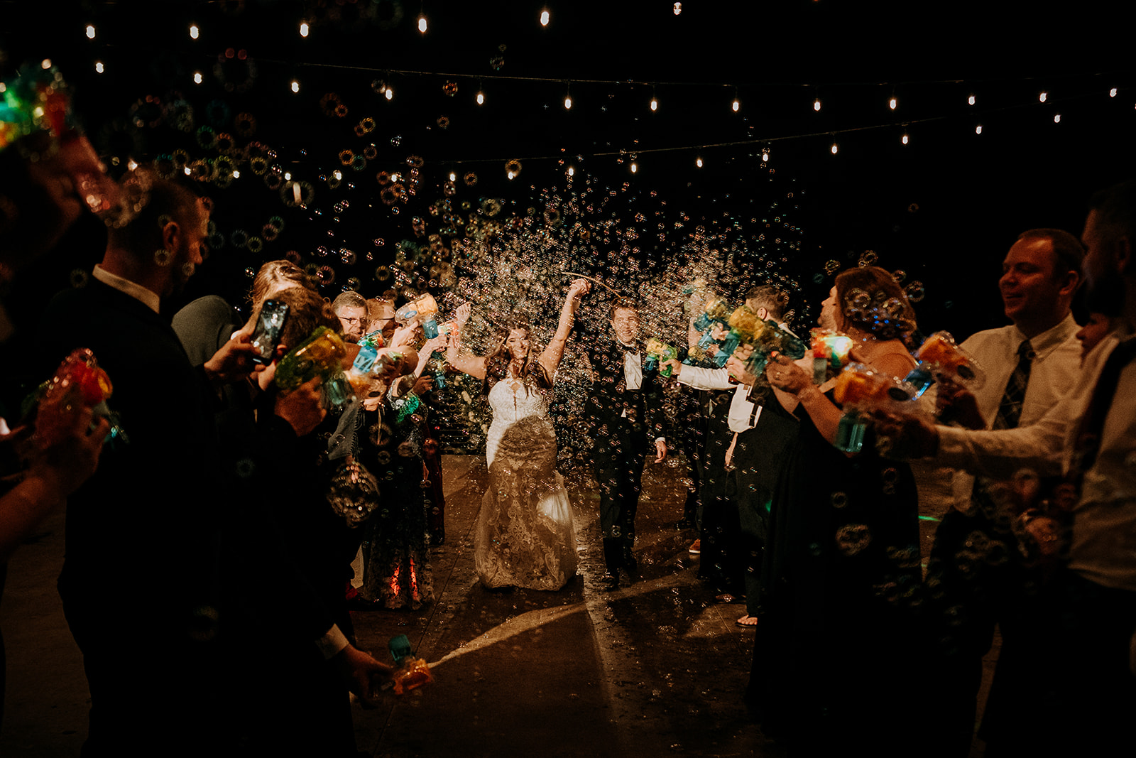 bubble send off wedding with bride and groom