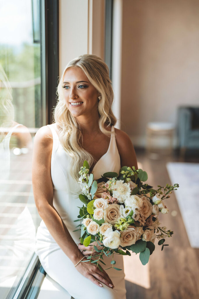 Bride and bouquet in the bridal suite