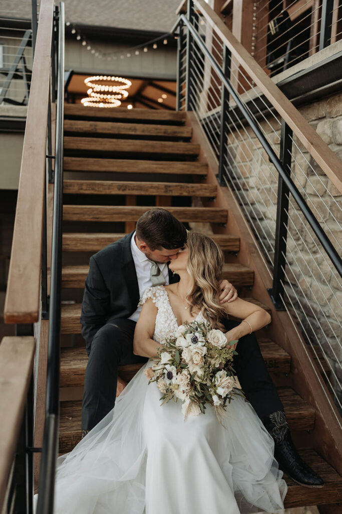 Romantic wedding couples portraits on the staircase 