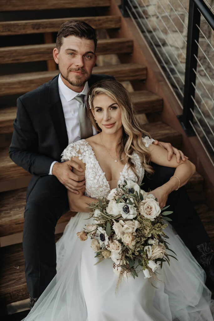 Romantic wedding couples portraits on the staircase 