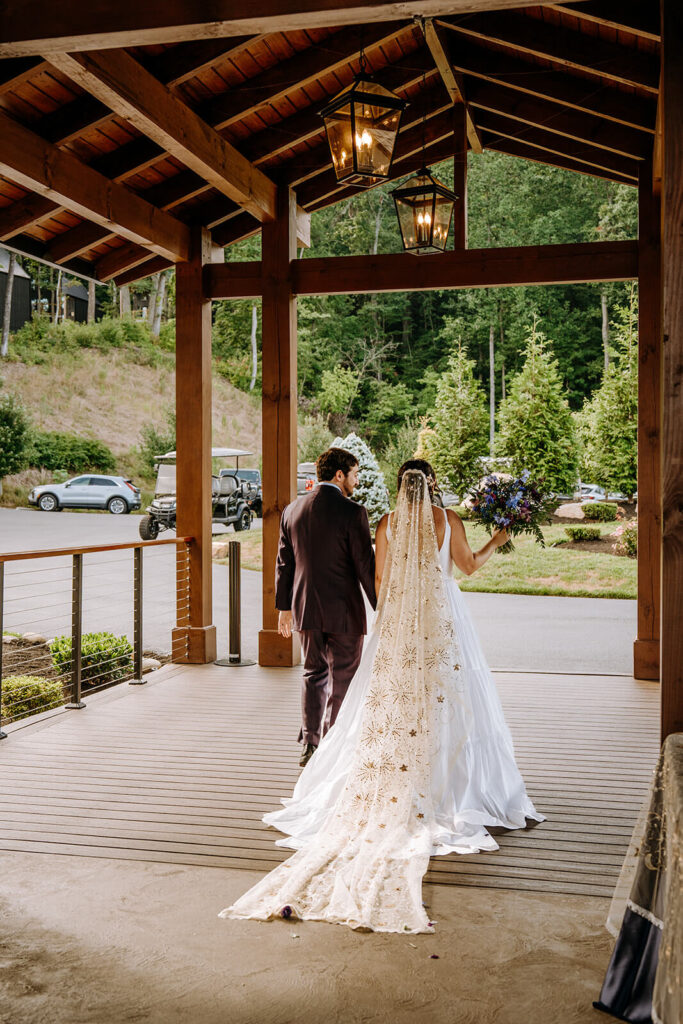 Married couple walking out of their ceremony