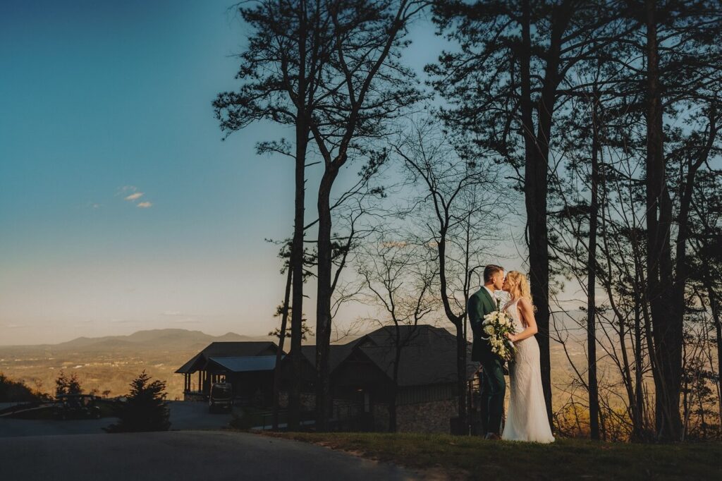 Couple embracing during golden hour at The Trillium, a luxury Smoky Mountain wedding venue