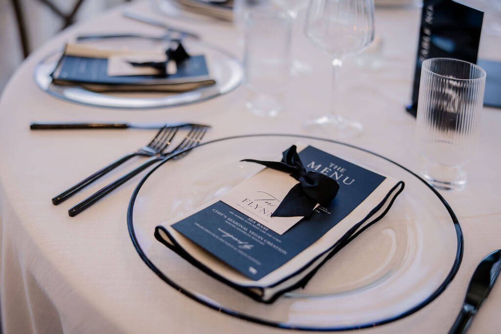 Black and White destination wedding, cross arbor, wedding reception at The Trillium Venue in East Tennessee, white wedding florals, black and white table decor