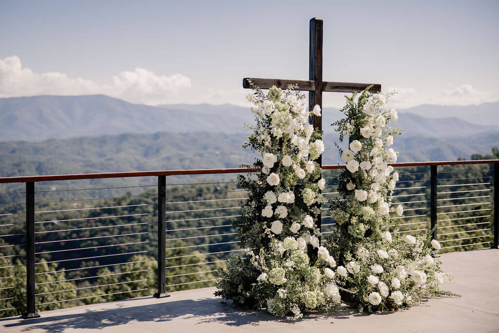Black and White destination wedding, cross arbor, wedding ceremony in the mountains, white wedding florals 