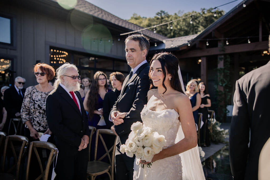 Black and White destination wedding, cross arbor, wedding ceremony in the mountains, white wedding florals 