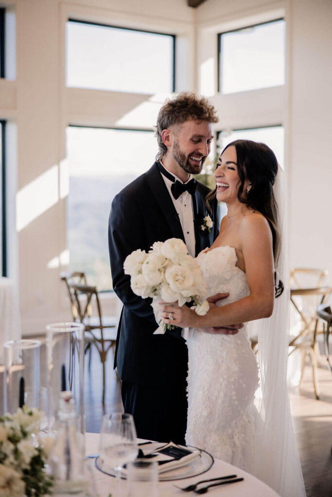 Black and White destination wedding, cross arbor, wedding reception at The Trillium Venue in East Tennessee, white wedding florals, black and white table decor