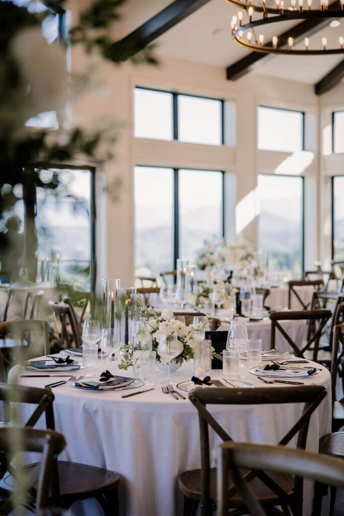 Black and White destination wedding, cross arbor, wedding reception at The Trillium Venue in East Tennessee, white wedding florals, black and white table decor